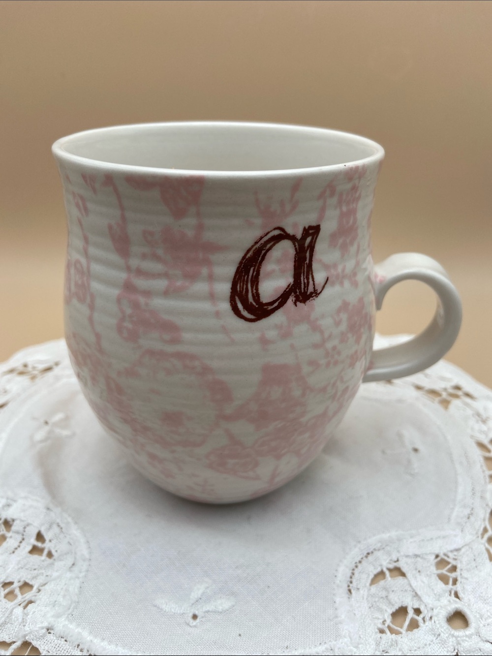 Anthropologie Homegrown Monagram a mug - pink and white